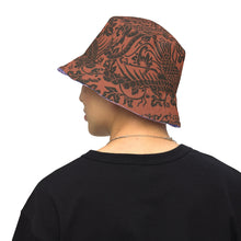 Load image into Gallery viewer, Melodia Gallery reversible bucket hat with phoenix and floral pattern in earth tones on one side, lavender and blue on the other.
