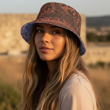 Load image into Gallery viewer, Melodia Gallery reversible bucket hat with phoenix and floral print on one side and blue floral print on lilac on the other.
