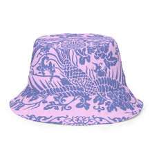 Load image into Gallery viewer, Melodia Gallery reversible bucket hat with a blue phoenix and floral pattern on a pink background.
