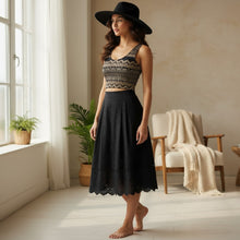 Load image into Gallery viewer, Melodia Gallery Shakti Lace Cotton Crop Top, a black and gold patterned sleeveless crop top made from a cotton-elastane blend.

