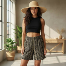 Load image into Gallery viewer, Melodia Gallery unisex black cotton shorts with intricate lace-inspired graphic print and relaxed fit.
