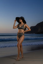 Load image into Gallery viewer, Melodia Gallery Shakti Lace Recycled High-waisted Bikini with black and tan geometric pattern, removable pads, zig-zag stitching.
