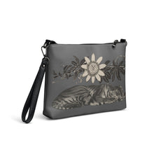 Load image into Gallery viewer, Melodia Gallery grey faux leather crossbody bag with a sleeping tiger and passionflower illustration. Includes wrist strap.
