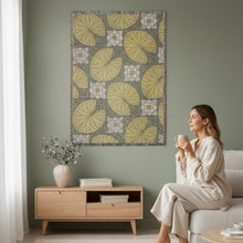 Load image into Gallery viewer, Melodia Gallery vintage woven cotton blanket with yellow water lily pads and white lotus flowers on a grey background.

